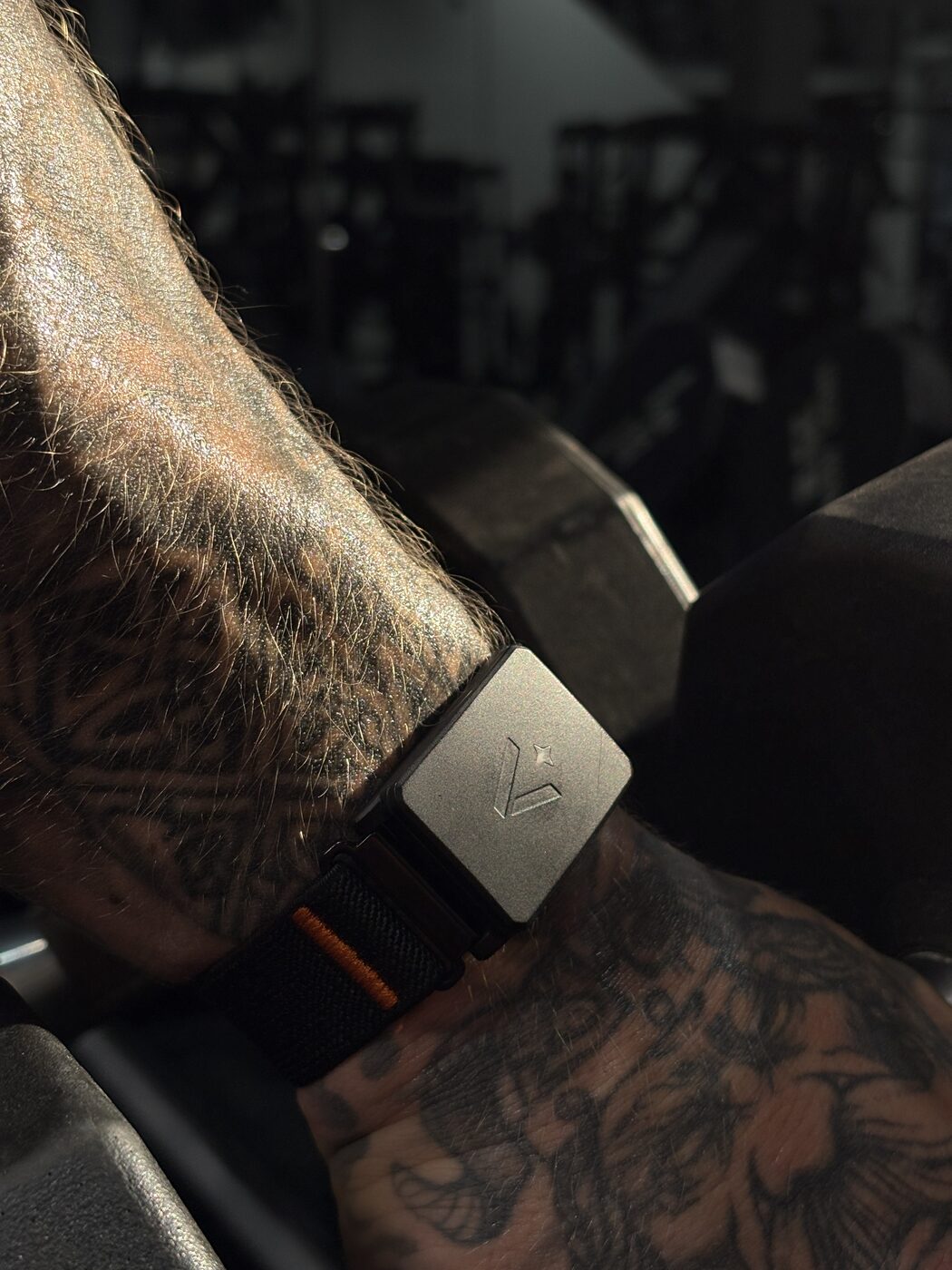 Velocity sensor worn on the wrist during a dumbbell press